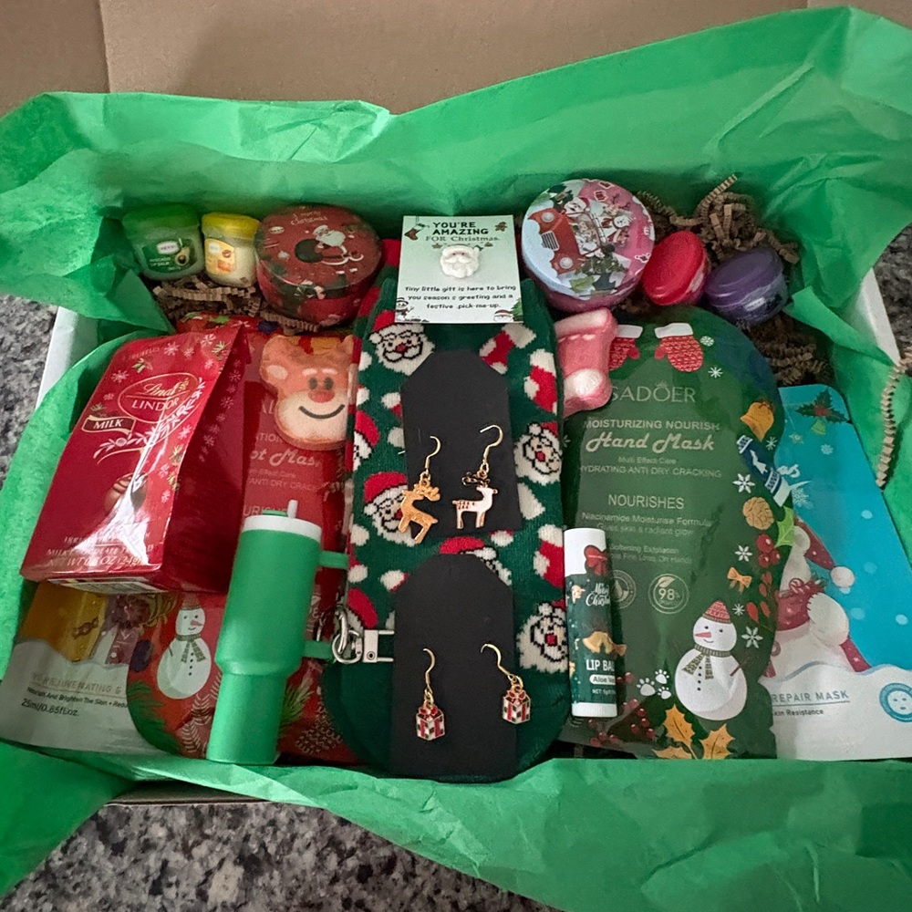 20 piece holiday themed spa gift box, includes lip balms, masks, candles & more